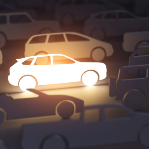 Glowing SUV car in rows of cars of other types.
